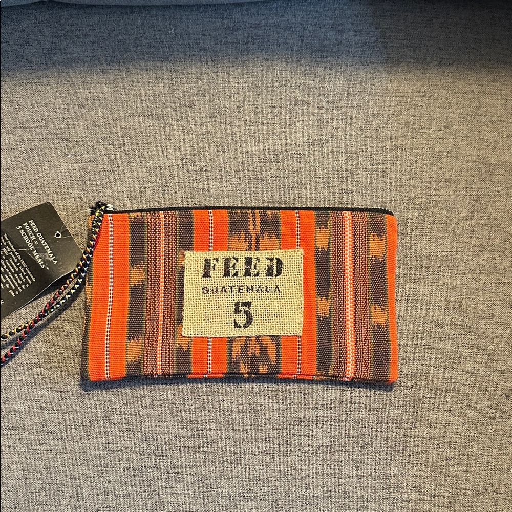 Feed Guatemala 5 Orange Clutch